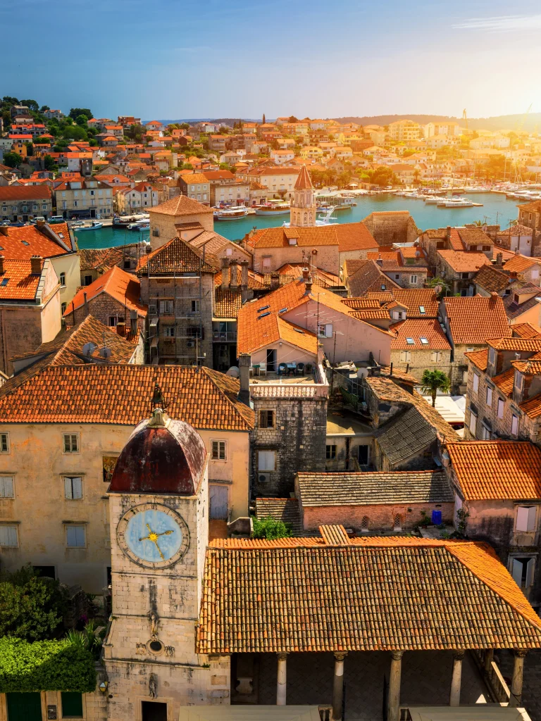 Areal view of Trogir at sunset with Central Piazza in forefront